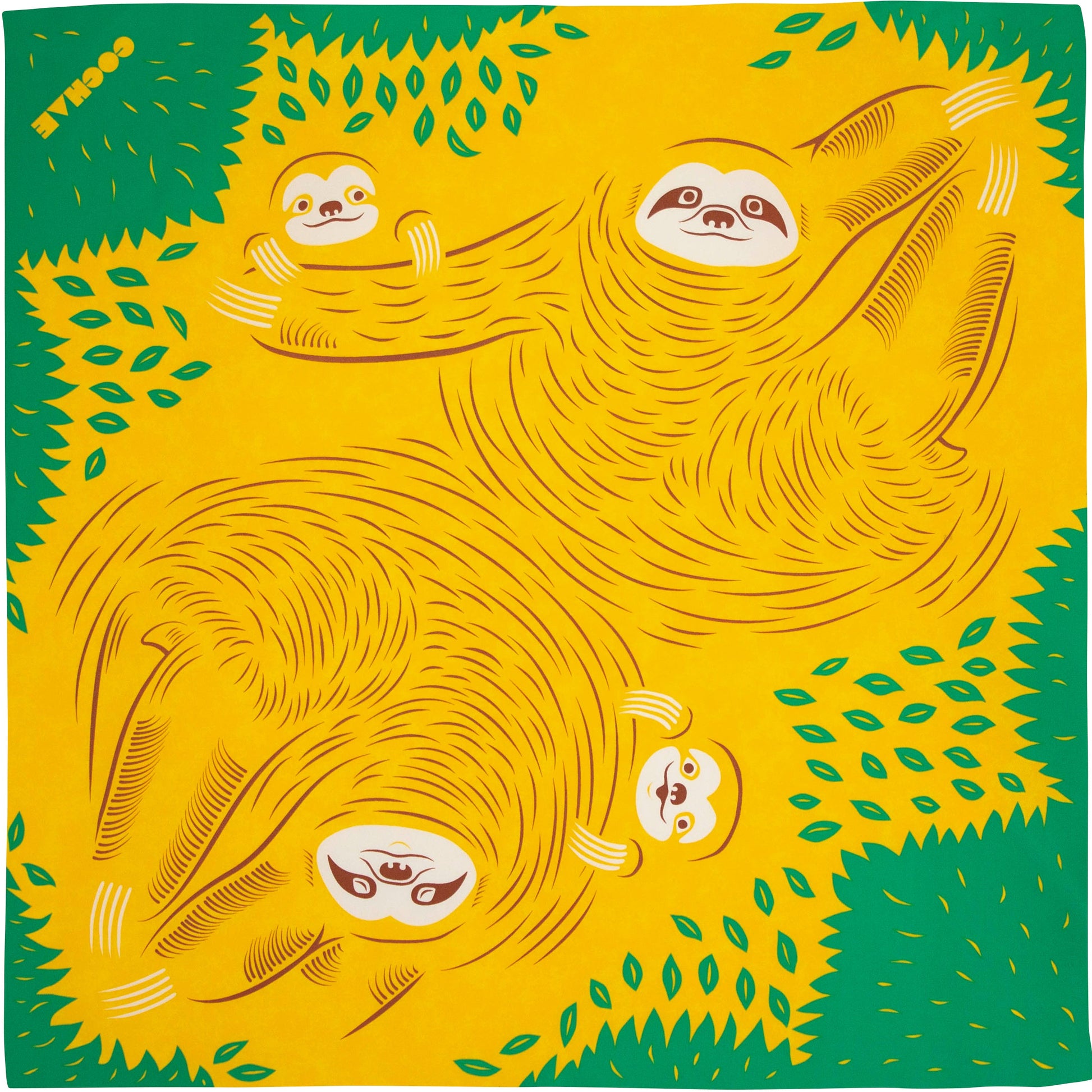 Flat lay view of a square Japanese furoshiki wrapping cloth featuring a yellow and green cartoon sloth pattern with parent and baby sloths hanging from trees.