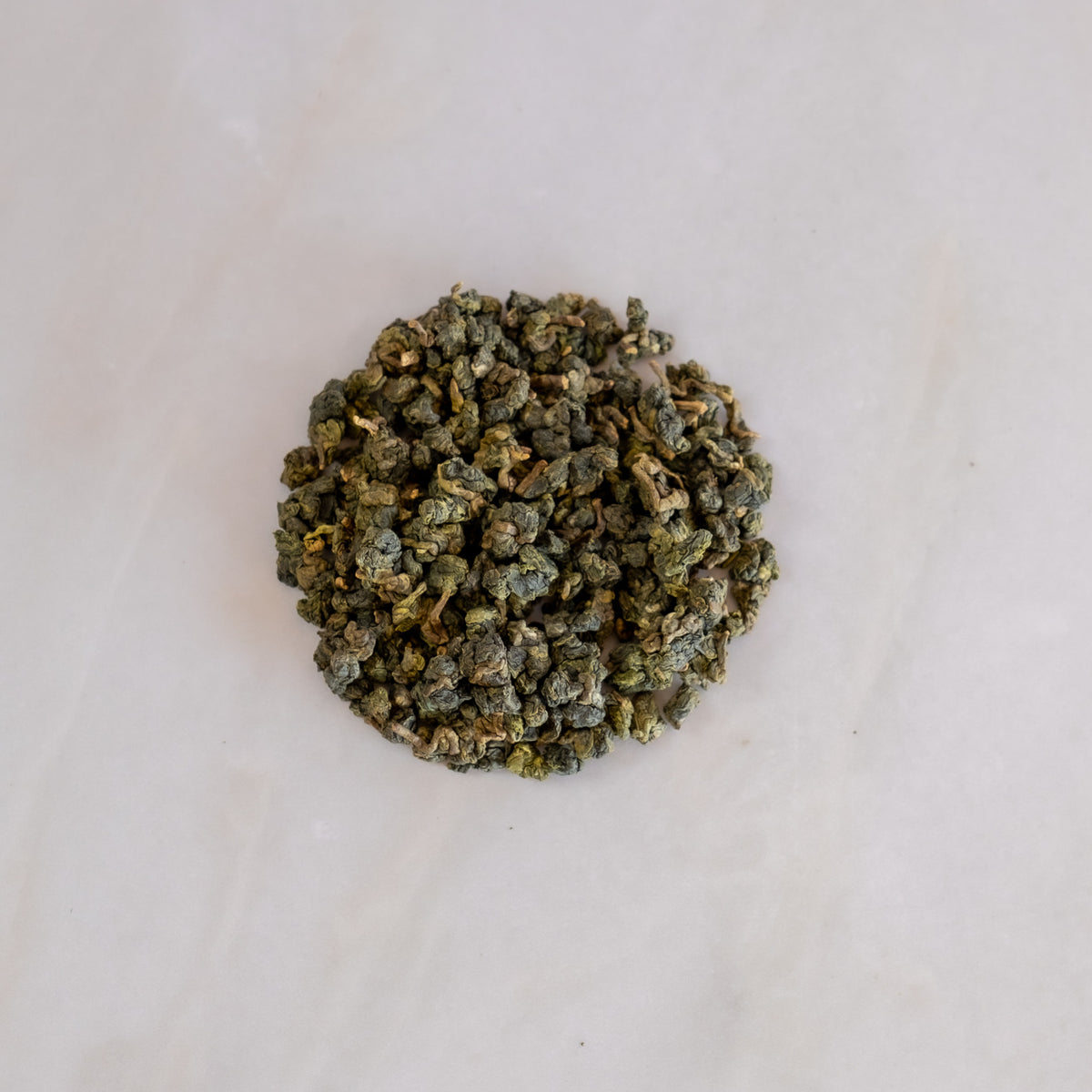 Dry whole-leaf Jin Xuan milk oolong tea leaves from Tea Studio Lu in Geneva, Switzerland